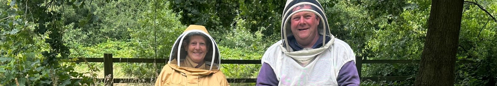 Jennifer And Bee Keeper With Bees